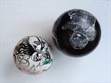 Traces of the story by Sara Muzira, Sculpture, Painting on found shot put balls